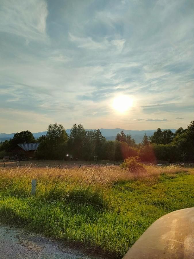 Západ slunce nad loukami